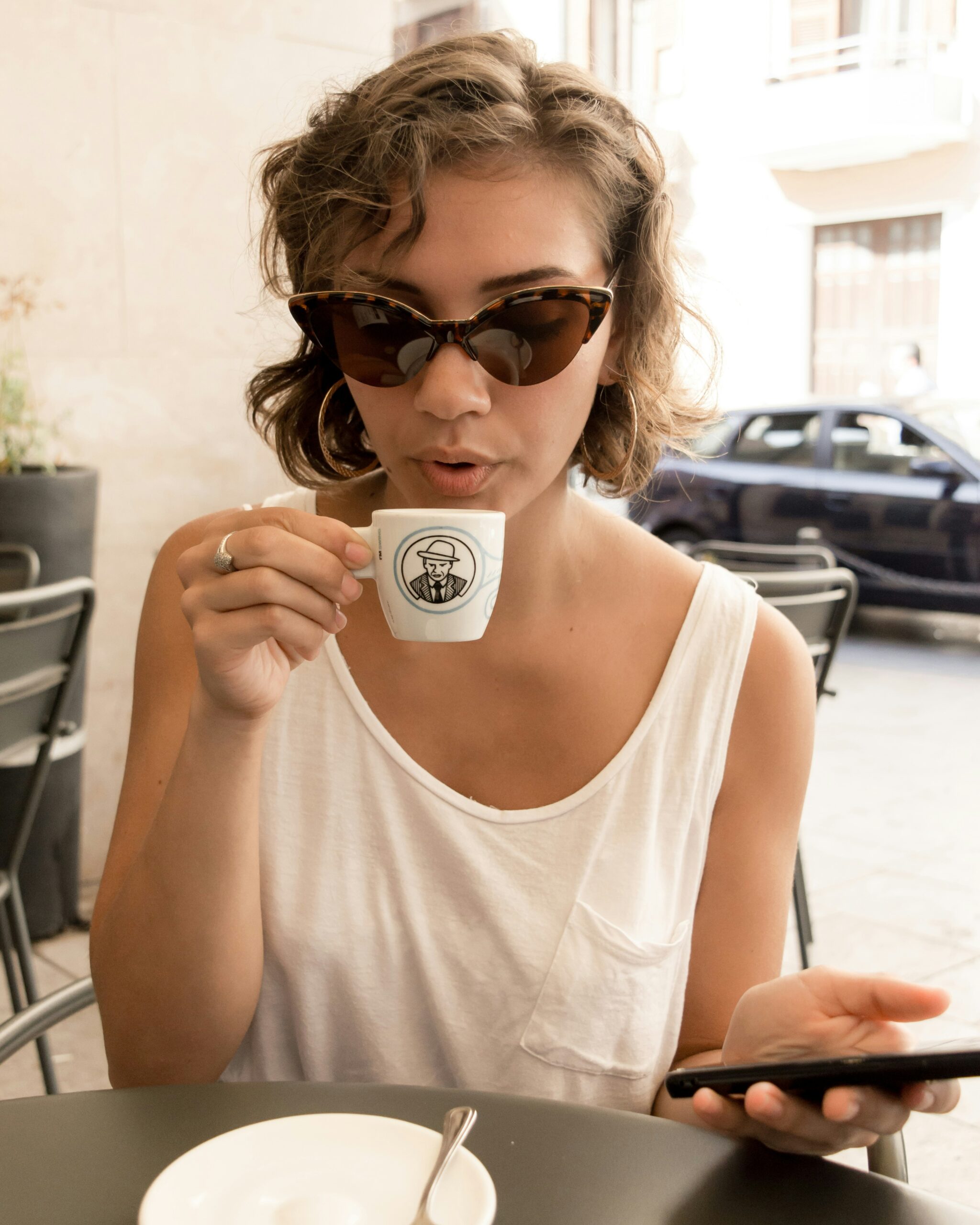 Woman looking doubtful while holding a generic coffee tin versus looking happy holding the official Marita can