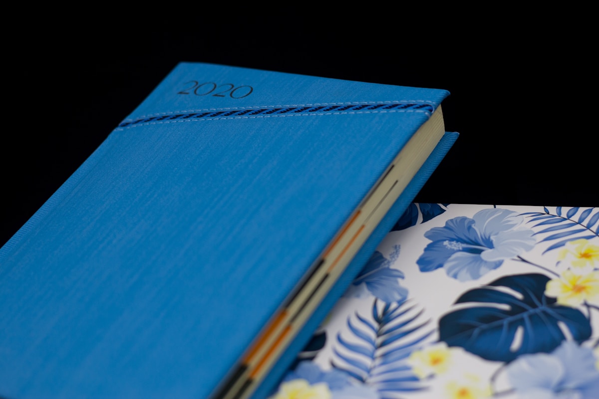 a blue book sitting on top of a table