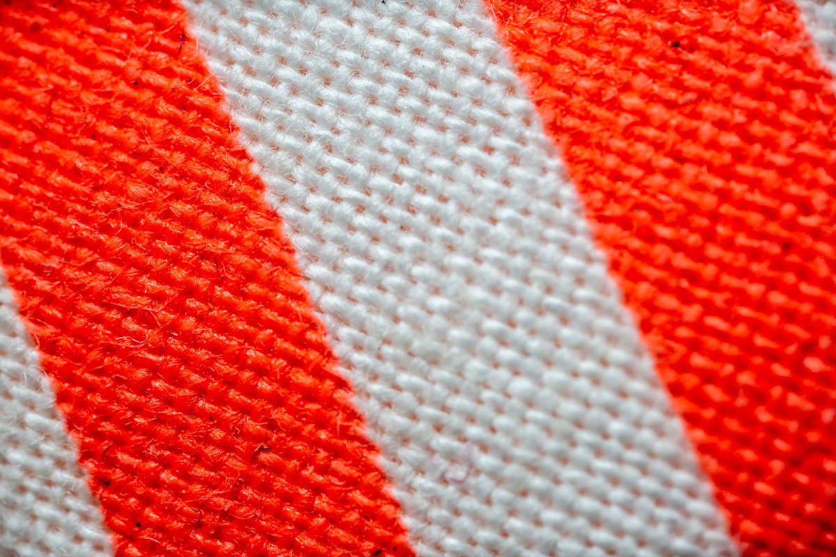 a close up of a red and white striped fabric