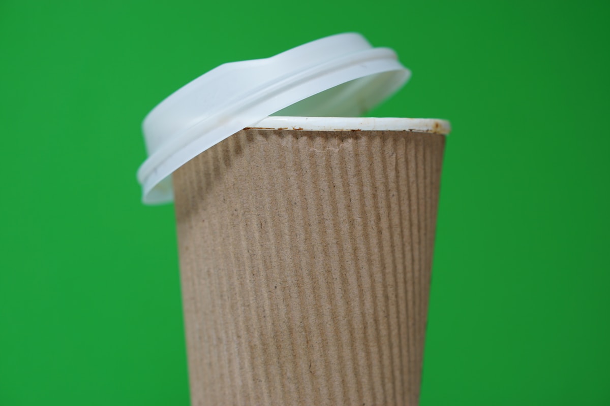 brown and white paper cup